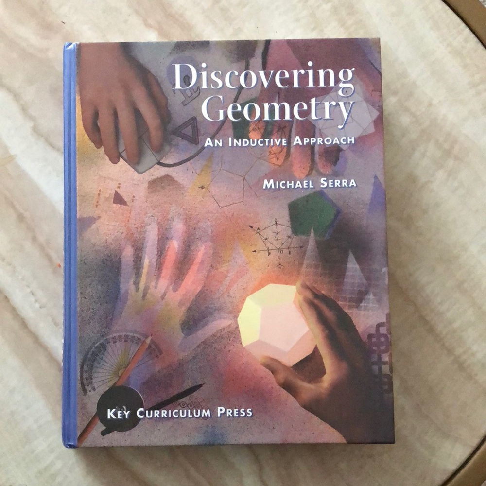 discovering geometry an introductory approach michael serra text book